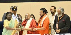 Jagatguru rambhadracharya honored at gayanpith awards ceremony