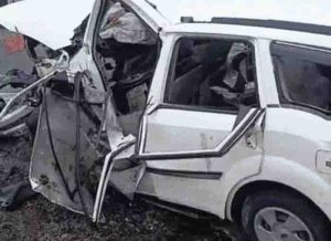 Car collides with divider, four including mother son killed