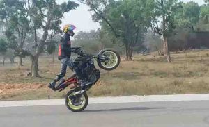 Bike stunt young man arrested