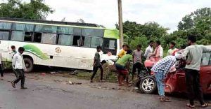 Two injured in bus and car