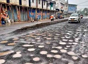 Babuji walks slowly on the streets of bhopal..